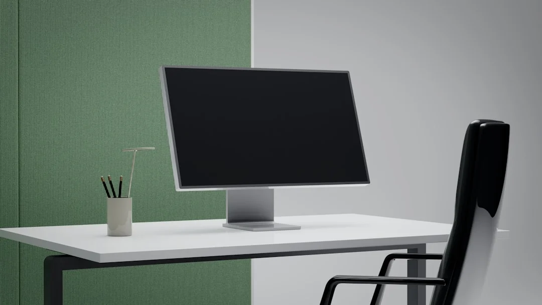 Minimalist desk with a focus on a multipurpose cleaner, office supplies, and storage solutions.